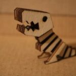 Laser Cut Tiny T-Rex Free Vector