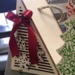Laser Cut Christmas Tree Packaging for Gift Free Vector
