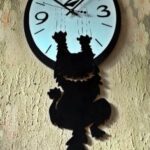Laser Cut Insolent Cat Wall Clock Free Vector