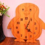 Laser Cut Penguin Wall Clock Free Vector