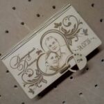 Laser Cut Wooden Decorative Book Shaped Box With Padlock Free Vector