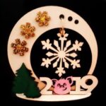 Laser Cut New Year Wooden Souvenirs Free Vector