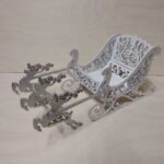 Laser Cut Christmas Decoration Santa Sleigh And Reindeer Free Vector