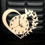 Laser Cut Clock with Heart and Butterflies Free Vector