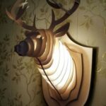 Wooden light decorative deer head Free Vector