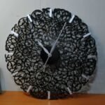 Laser Cut Unique Round Wall Clock Free Vector