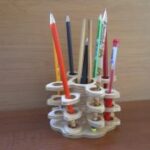 Laser Cut Multi Layered Art Design Pencil Holder Free Vector