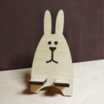 Laser Cut Creative Cute Rabbit Desktop Phone Stand Free Vector