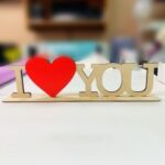 Laser Cut I Love You  Wooden Letters With Red Heart Shape On Stand Free Vector