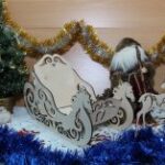 Laser Cut Wood Christmas Sleigh and Reindeer Free Vector