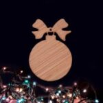 Laser Cut Christmas Bauble With Bow Wooden Christmas Craft Shape Free Vector