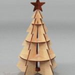 Laser Cut Christmas Tree With Star Free Vector