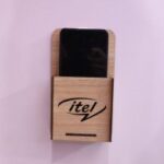 Laser Cut Wall Mounted Mobile Holder With Itel Logo Free Vector