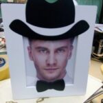 Laser Cut Picture Frame With Hat And Bow Free Vector