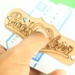 Laser Cut Book Page Thumb Holder Free Vector