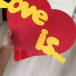 Laser Cut Heart with Letters Love Is Free Vector