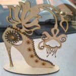 Laser Cut Shoe Shaped Jewelry Stand Free Vector