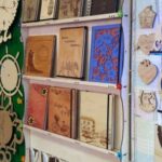 Laser Cut Notebooks Postcards Display Shelf Free Vector