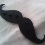 Laser Cut Wooden Mustache Shaped Hanger Free Vector