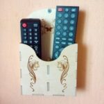 Laser Cut Wall Mounted Remote Control Holder Free Vector