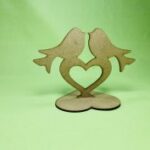 Laser Cut Love Birds On Heart Stand Free Vector