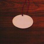 Laser Cut Oval Shape Wood Ornament Free Vector